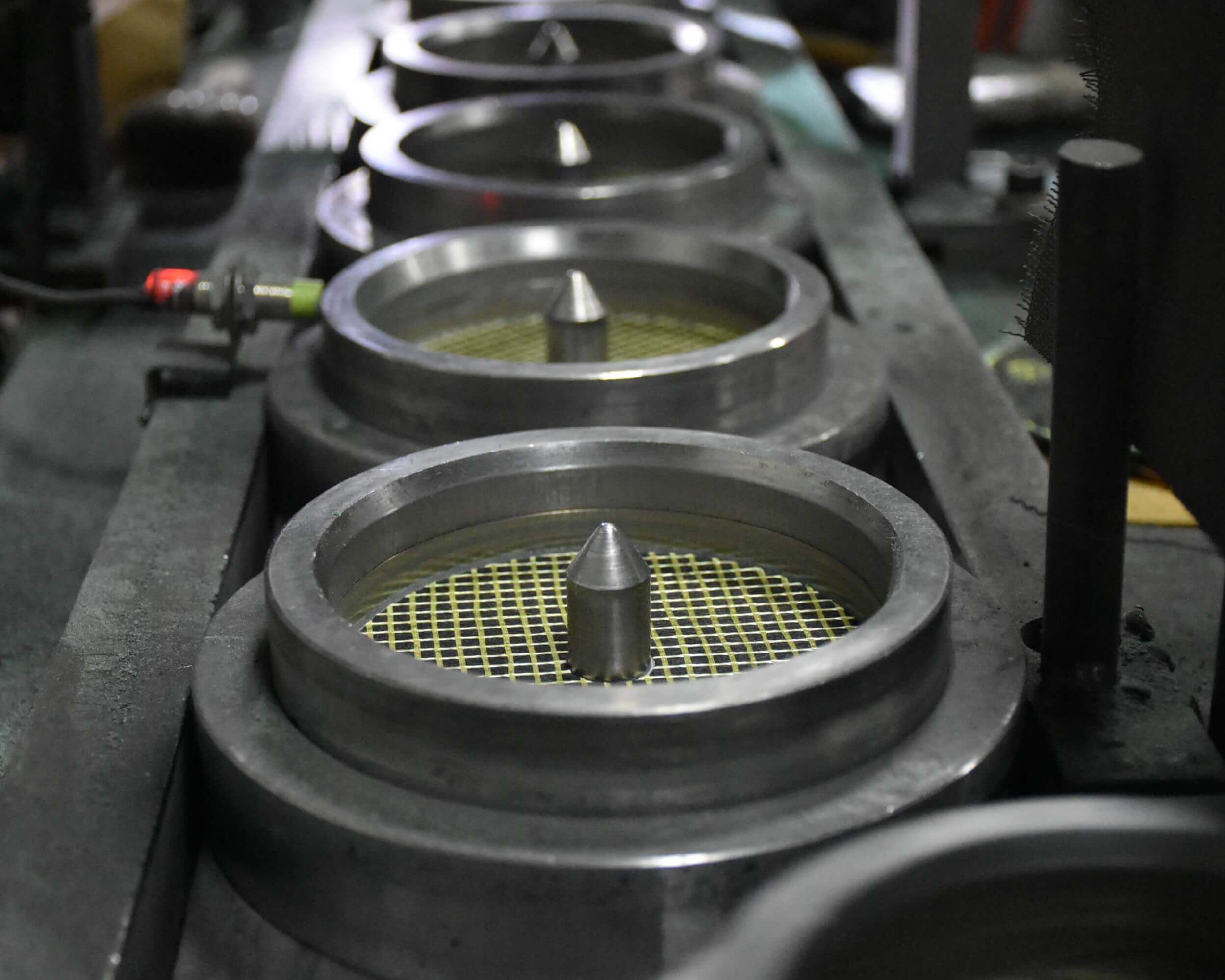 Cutting and grinding disc making machine